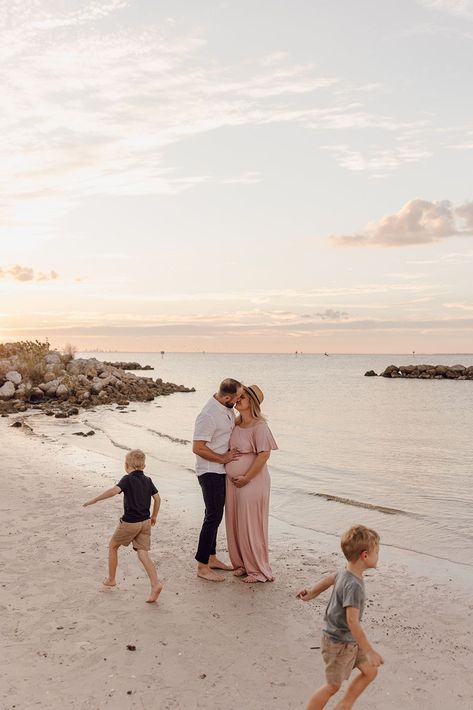 Are you interested in capturing your next milestone with family photos? To document this season of life, so you can look back on these family pictures for years to come, book with me to capture your beach pictures in Florida! I know how valuable these moments are to you, and feel so grateful to be able to provide you with timeless photos that you will always look back on. Click on this pin to book with me for your beach family photos, couples photoshoot, or couple maternity pictures! Maternity Photography Beach Family, Maternity Beach Photoshoot With Kids, Beach Family Maternity Photos, Beach Maternity Photos With Toddler, Beach Maternity Photos Family, Couple Maternity Pictures, Family Pregnancy Photoshoot, Pregnancy Photoshoot Beach, Pictures At The Beach