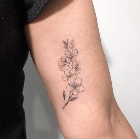 Floral Tattoo With Name Stem, Water Lily Wrist Tattoo, Bicep Flower Tattoo, Fineline Floral Tattoo, Mum Tattoos, Above Elbow Tattoo, Jasmine Tattoo, Handwriting Tattoos, Mum Tattoo