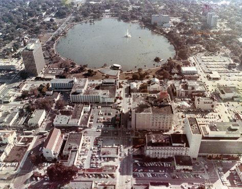 Florida Memory • Aerial view looking east over a section of Orlando next to Lake Eola. Lake Eola, Florida Oranges, Downtown Orlando, Aerial Photograph, Washington Street, Central Business District, Old Florida, Business District, Change Background