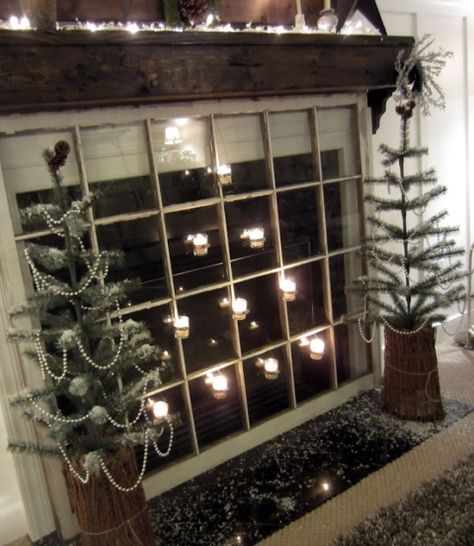 Down to Earth Style - old window as fireplace cover with candles - via Remodelaholic Winter Mantels, Earth Style, Fireplace Cover, Wooden Fireplace, Brick Fireplace Makeover, Paint Fireplace, Candles In Fireplace, How To Recycle, Window Projects