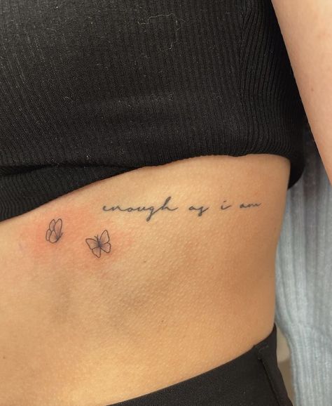 Princess Tattoo Writing On Hip, Still I Rise Rib Tattoo, Ribcage Word Tattoo, Live With No Regrets Tattoo, Left Rib Tattoo, Small Written Tattoos For Women, Betrayal Tattoo Ideas For Women, Ce Est La Vie Tattoo, Rib Word Tattoos For Women