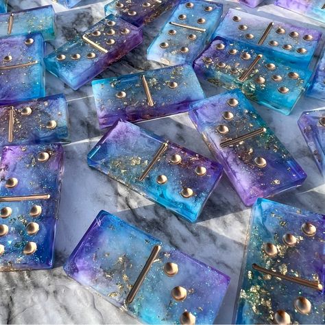 Hand Poured High Quality Resin Dominos - Set Of 28 Purple, Blue & Glitter Galaxy W/ Gold Leaf Details. Each One Is Unique Measurements 1" X 2" Bundle Any 2 Items And Get 15% Off! Boutique Items Are Non-Negotiable Because They’re All Handmade With Love. Dallas Cowboys Dominoes Resin, Resin Crafts Halloween, Resin Coffee Bean Coasters, Custom Dominoes Set Resin, Small Resin Projects, Resin Dominoes Ideas, Epoxy Dominos, Resin Geode Table, Unique Resin Ideas