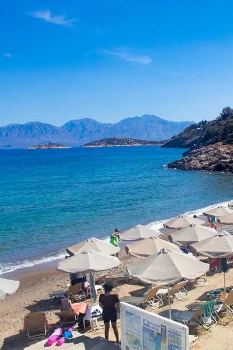 Looking for some of the best beaches in Crete?  Take a look at these beaches in Agios Nikolaos, Crete! From the stunning Almiros to the family-friendly Ammoudi Beach, these are some of the most beautiful beaches in Crete.  Take a look! CreteBeaches ;GreeceBucketList; best places to visit in Crete Agios Nikolaos Crete, Beaches In Greece, Beaches To Visit, Bus Route, Free City, Crete Greece, Palace Hotel, Beach Signs, North Coast