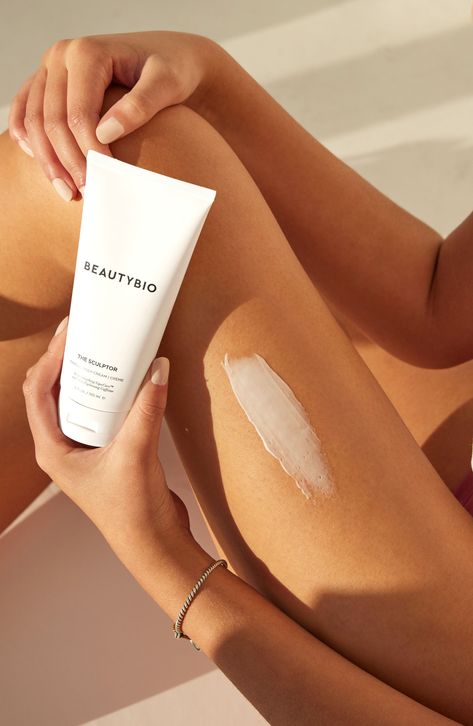 What it is: A body cream formulated with an advanced LipoCare ingredient to tackle stubborn thigh and body dimpling.Who it's for: All skin types.What it does: This unique reverse emulsion body butter melts into skin, providing a luxuriously hydrating cashmere feel all day. Firming sea algae helps to improve elasticity and targets crepey, loose skin, while arginine helps prevent against free radical damage. Organic green tea oil and aloe vera promote deep hydration, and rich emollients condition Body Cream Photography, Sea Algae, Body Firming Cream, Green Tea Oil, Organic Green Tea, Christmas Planner, Skin Remedies, Loose Skin, Natural Medicine