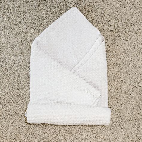 How to Roll a Spa Towel How To Roll Hand Towels Bathroom, Spa Towel Folding, Rolled Towels Bathroom, Fold Towels Like Hotel, Folding Bath Towels, Hand Towel Folding, How To Roll Bath Towels, Towel Folding Ideas, Fold Hand Towels