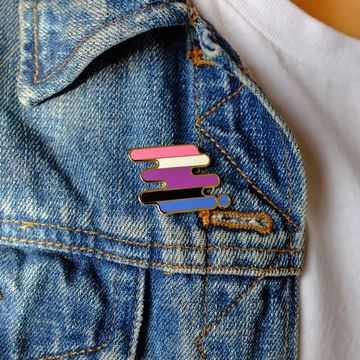 Shop inclusive enamel pins that you can wear on your jacket, hat, backpack, lapel and more. Queer Gifts, Logo Amp, Genderfluid Pride, Pride Flag Colors, Gender Fluid, Paper Sleeves, Enamel Lapel Pin, Sticker Patches, Black Plates