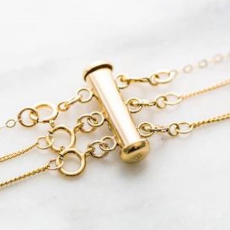 No more tangled necklaces! Rose Gold Brass Charm Necklace With Adjustable Chain, Gold-tone Brass Necklace With Adjustable Chain, Elegant Nickel-free Brass Charm Necklaces, Gold-tone Lariat Necklace With Lobster Clasp, Nickel-free Yellow Gold Brass Necklace, Tangled Necklace, Necklace Clasp, Silver Jewelry Necklace, Necklace Clasps