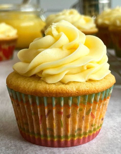 Passion Fruit Cupcakes filled with Passion Fruit Curd and topped with Passion Fruit Curd Buttercream…I mean what else do you need? Check out this recipe for some of the best cupcakes you will ever make or eat!Since these cupcakes are filled with a creamy passion fruit curd, I knew I wanted the cupcake to be super light and moist. The passion fruit curd buttercream is also really dense so the cupcake had to be light. This basic vanilla cupcake base is the perfect complement to the passi… Passionfruit Cupcakes Recipes, Passion Fruit Buttercream, Passion Fruit Frosting, Passion Fruit Buttercream Recipe, Passion Fruit Cupcakes, Cupcakes With Filling Inside, Passionfruit Cupcakes, Passionfruit Buttercream, Fruit Cupcakes Recipes