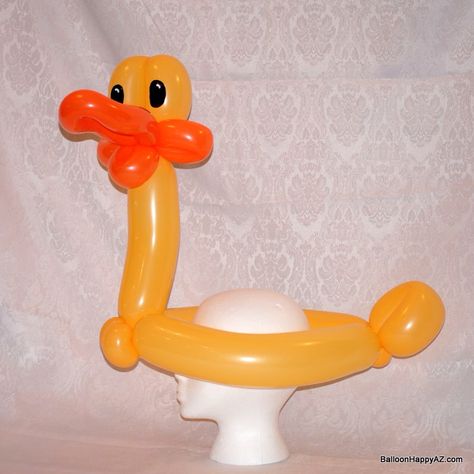 Balloon duck hat Duck Balloon, Easter Balloon Decor, Balloon Hats, Cardboard Props, Clown Balloons, Duck Hat, Balloon Hat, Twisting Balloons, Balloon Toys