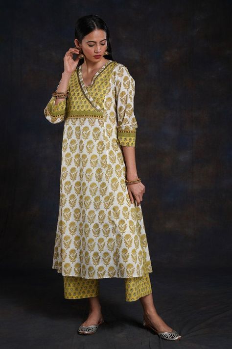 *Click on the image to see all the available yellow kurtis collection*>These are perfectly suitable for haldi ceremony and other special ocassions.#yellowkurti Printed Kurti Designs, Cotton Garments, Indian Kurti Designs, Churidar Designs, Simple Kurta Designs, Designer Kurti Patterns, Simple Kurti Designs, Neck Designs For Suits, Salwar Designs