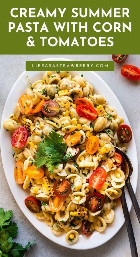 This easy, creamy tomato pasta uses fresh summer corn with cilantro or basil! One of our best quick dinner recipes for summer - great for using your CSA share! This delicious pasta has a simple sauce of cream cheese, lemon juice, and a splash of starchy pasta water for a silky sauce that requires almost no work. Like most easy pasta recipes, you can customize this recipe with extra veggies or protein like bacon, shrimp, or salmon). It'll be a new favorite in your summer pasta recipes ... Easy Creamy Tomato Pasta, Dinner Recipes For Summer, Bacon Shrimp, Grilled Sweet Corn, Quick Vegetarian Dinner, Summer Pasta Recipes, Creamy Tomato Pasta, Tomato Pasta Recipe, Corn Pasta