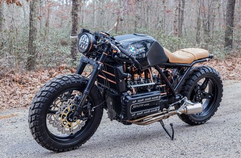 When he’s not fabricating parts for submarines (Yes, you read that right) David Manchester is building bespoke furniture or helping his wife to run her events business. Somewhere in between all that though he devotes his time to his passion, building custom motorcycles. This stunning ’95 BMW K1100 cafe racer is his latest work and thanks to his keen aesthetic eye and retrained use of copper it’s one of the best flying bricks we’ve ever seen. “There is no other [&#82 Motos Bmw, Serie Bmw, Bmw K100, Мотоциклы Cafe Racers, John Malkovich, Cafe Racing, Bmw Cafe Racer, Cafe Racer Build, Motorcycle Types