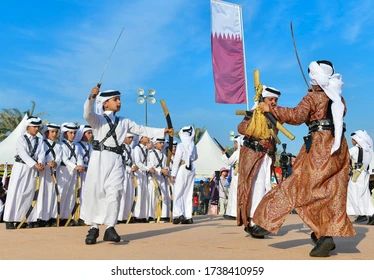 NOVEMBER 10,2017-DOHA,QATAR:Qatari boys perform performing traditional dances during Qatar Museum of Islamic Art Community Day Event at Museum of Islamic Art park in Doha Qatar Museum, Qatar National Day, Museum Of Islamic Art, Art Park, Football Tournament, City Lifestyle, Doha Qatar, Traditional Dance, Military Forces