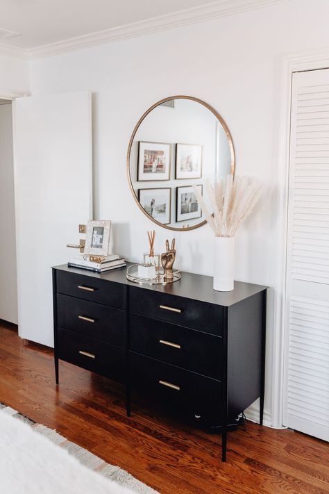 Bedroom Black Dresser Decor, Black Bedroom Dresser Decor, Black Dresser In Bedroom, Black Dresser Bedroom Decor, Black Dresser Styling, Bedroom With Black Dresser, Black Dresser Decor Bedroom, Round Mirror Over Dresser, Dresser Top Ideas Bedroom