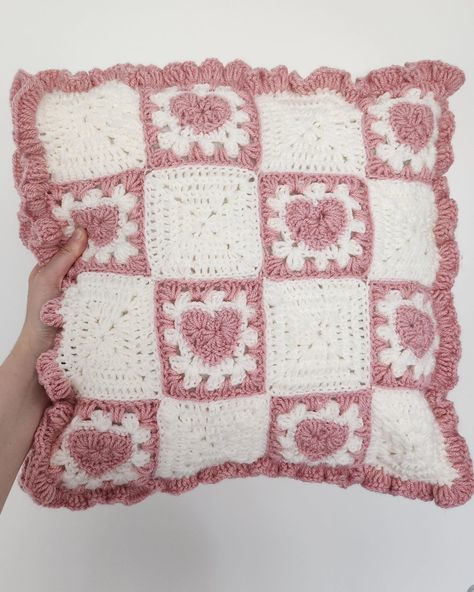 Heart granny square pillow 🩷◻️ and another pillow done!!! ✨️ . . . My cats are photobombing 90% of my photos 😿🫶 . . . . . #crochetpillow #handmadepillow #crochetdecor #pinkandwhite #crochetlove #crochetaddict #crochetdesign #crochetinspiration #crochetcreations #crochetartist #crochetproject #crochetpattern #crochetlife #crochetlovers #crochetfun #crochetcraft #crochetart #crochetcommunity #crochettherapy #crochetobsessed #pink #white #crochet #pillow #handmade #pillowcase #pinkandwhite Crochet Pillow Cover Granny Square, Heart Granny Square Pattern, Pillowcase Crochet, Pink Granny Square, Granny Square Pillow, Heart Granny Square, Bow Pillows, Crochet Decor, Crochet Pillow Cover