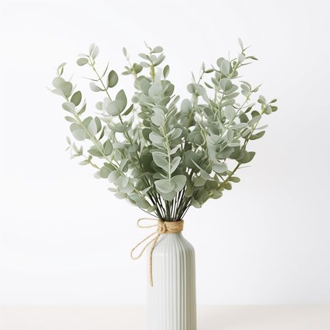 PRICES MAY VARY. 1. Abundant Set: This pack includes 20 pieces of faux eucalyptus stems, providing ample greenery for all your decorating needs. 2. Premium Quality: Each eucalyptus stem is crafted from high-quality, realistic materials, ensuring long-lasting beauty without the need for maintenance. 3. Natural Look: Designed to mimic the natural elegance of real eucalyptus, these stems add a fresh, lifelike touch to any space. 4. Versatile Use: Perfect for home decor, weddings, office arrangement Eucalyptus Simple Centerpiece, Eucalyptus Office Decor, Eucalyptus Plant Aesthetic, Sage And White Centerpieces, Fake Eucalyptus Decor, Earthy Centerpieces, Eucalyptus Nursery, Office Arrangement, Everyday Centerpiece