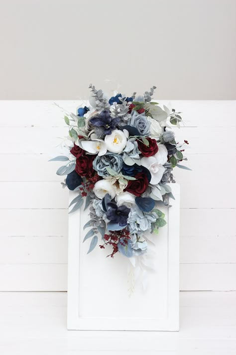 "The bouquet is made of flowers and leaves of high quality. All dimensions are total length or width. The length of the cascading bouquet is 20\" Thanks for visiting 😊"