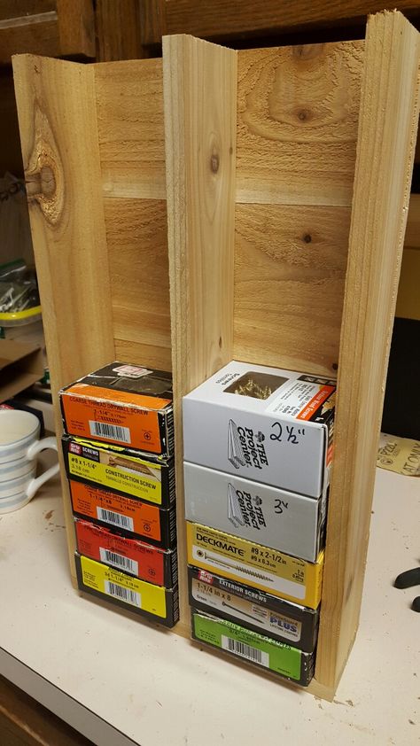 Screw & Nail Organizer. It's as easy as it looks. The boxes fit in the slots tight. I used leftover cedar boards and made it 3" deep so I can grab boxes. Screw Nail Organization, Screw And Nail Organization, Screws And Nails Organization, Nails And Screws Storage Ideas, Nail And Screw Storage Ideas, Screw And Nail Storage Ideas, Nail And Screw Storage, Nail And Screw Organization Ideas, Screw Box Storage