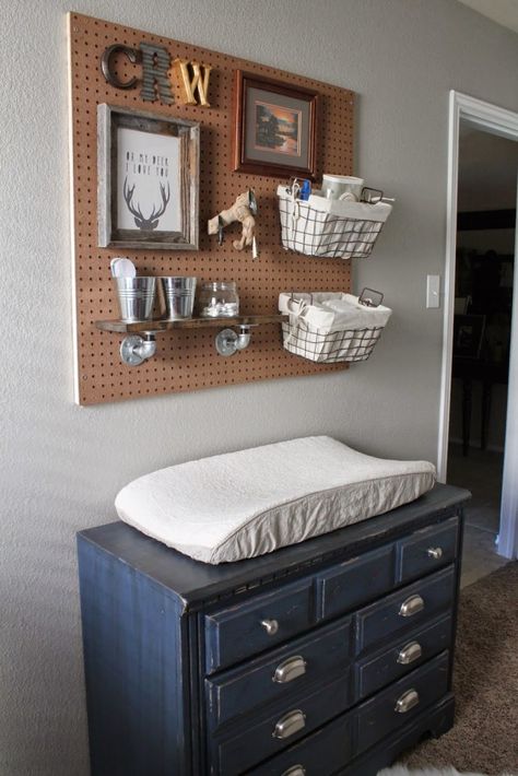 Love the use of a pegboard over the changing table to hold diaper supplies in this rustic hunting and fishing-themed nursery! Fishing Nursery, Boy Nursery Themes, Changing Tables, Themed Rooms, Baby Nursery Themes, Nursery Organization, Project Nursery, Baby Time, Nursery Inspiration