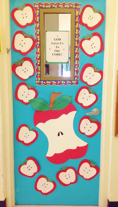 Fall Apple Door. Children made apples using construction paper and black beans… Apple Theme Classroom, Apple Bulletin Boards, Classroom Door Decorations, Preschool Door, Apple Classroom, Apple Drawing, School Door Decorations, Poster Decoration, Preschool Bulletin