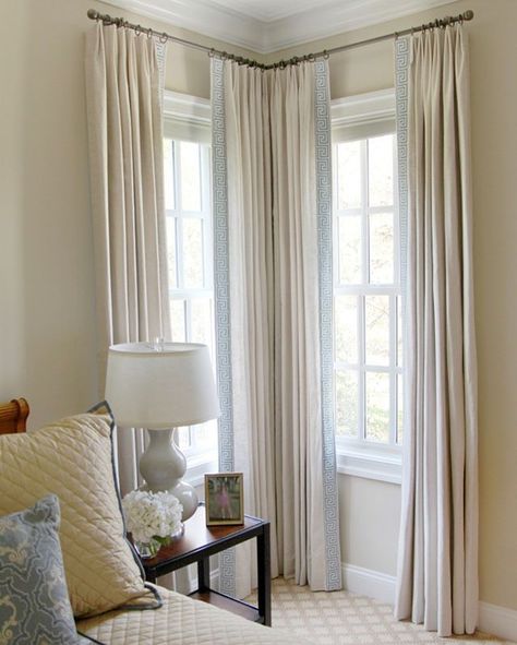 Unsure how to hang curtains on a tricky corner? That's where we come in! The smart window treatments in this Baltimore bedroom were designed by Kellogg Collection designer Diane Litz and finished with a beautiful blue banded trim. . . . . #baltimoremd #baltimore #windowtreatments #windows #classic #homedecor #room #home #roomgoals #lovely #decorate #decor #design #fabric #quality #designer #furniture #homeaccessories #hgtv #houzz Corner Window Curtains, Corner Window Treatments, Corner Curtains, Bedroom Drapes, Window Treatments Living Room, Window Treatments Bedroom, Corner Window, Fabric Curtain, Living Room Corner