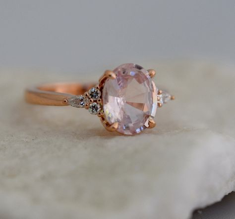 Pink Sapphire Ring Rose Gold, Pink Moissanite Engagement Ring, Sapphire Engagement Ring Oval, Round Sapphire Engagement Ring, Rings Inspiration, Moonstone Engagement Ring Rose Gold, Rose Gold Oval Engagement Ring, Pink Engagement, Peach Sapphire Engagement Ring