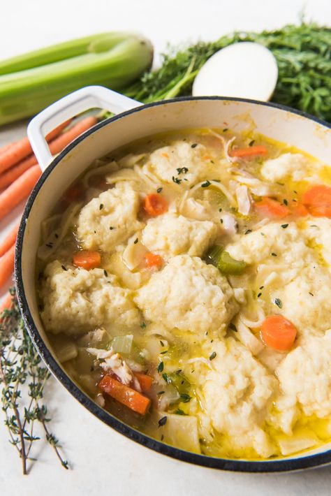 My favorite soup from my childhood, Chicken Noodle & Dumpling Soup is made with homemade egg noodles, super easy dumplings from scratch, and loaded with shredded chicken, carrots, cabbage, celery, and onions!  It's comfort food at it's best! Noodle Dumpling Soup, Easy Chicken And Dumplings, Egg Dumplings, Easy Dumplings, Chicken Dumpling Soup, Homemade Chicken And Dumplings, Comfort Food Chicken, Homemade Egg Noodles, Dumpling Soup