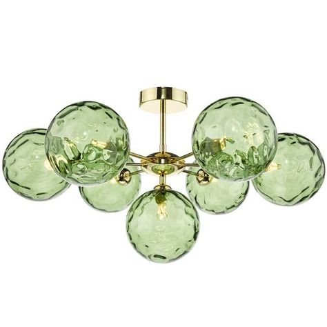 The Cohen 7 light semi-flush ceiling light in polished gold with Green Dimpled Glass Shades is a more modern stripped-down take on the sputnik chandelier popularised in the sixties when the space race was capturing the imaginations of designers and homeowners alike. With the missions to mars and SpaceX activity recently, we've been inspired to make a modern version of this classic; we've chosen the polished gold and smoked glass to bring it in line with current trends and make it easy to decorat Green Chandeliers, Mary Quant, Space Race, Semi Flush Lighting, Semi Flush Ceiling Lights, Sputnik Chandelier, Low Ceiling, Flush Ceiling Lights, Bedroom Lighting