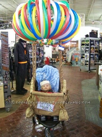 I decided to make a hot air balloon costume for my 1 year old son G, he hadn't been walking long so I was afraid if I attached the costume to him he w... Hot Air Balloon Costume, Stroller Halloween Costumes, Stroller Costume, Balloon Costume, Wheelchair Costumes, Pumpkin Song, Kid Costume, Cabbage Patch Babies, Baby Food Chart