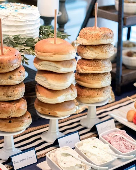 THURSDAY TIPS: Hosting a party or shower at your house and serving brunch? There are tons of easy ways to get creative with your food display and kick your decor up a notch that won't break the bank! Instead of putting bagels on a platter, we attached wood dowels to these cupcake stands from the dollar section at Target and boom...instant height. Bonus: it makes eating carbs that much more fun when they're stacked in towers. ;)⠀ ⠀ To see more of this baby shower brunch, click the link in our ... Baby Shower Brunch Food, Wedding Shower Brunch, Bagel Bar, Brunch Decor, Cupcake Stands, Breakfast Party, Baby Shower Brunch, Bridal Shower Food, Birthday Brunch