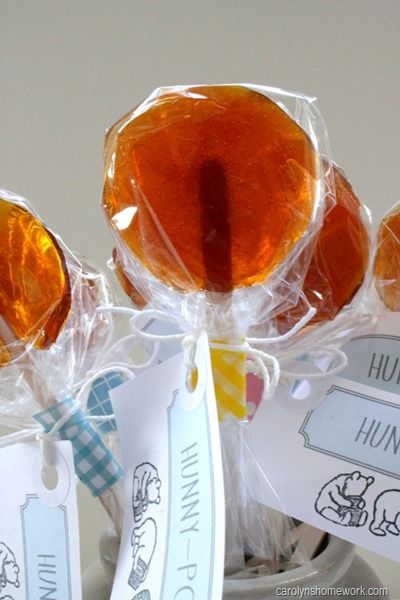 Hunny Pops inspired by Winnie the Pooh Did you know that honey is a great way to soothe a sore throat? It’s also used as a cough suppressant. According to some studies honey works better than over-the-counter cough medicine for nighttime coughing (source). So while I was taking a trip down memory lane and watching that silly old bear and his adorable friends, I decided to make some HoneyPops. Soothe A Sore Throat, Honey Pops, Sore Throat And Cough, Honey Works, Winnie The Pooh Honey, Lollipop Sticks, Sauce Pan, Cold Remedies, Homemade Remedies