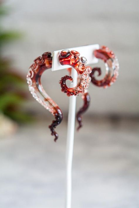 Hey, I found this really awesome Etsy listing at https://www.etsy.com/ca/listing/555870803/blood-in-the-water-resin-tentacleoctopus Siren Jewelry, Blood In The Water, Octopus Earrings, Octopus Jewelry, Crows Nest, Pirate Jewelry, Fake Gauge Earrings, Gauge Earrings, Ocean Earrings