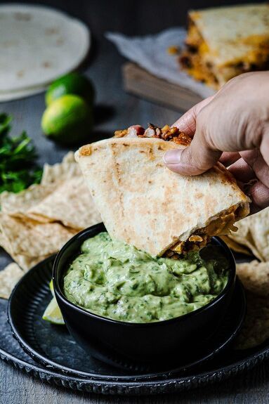 - Crumbled Tempeh Quesadillas : A vegetarian quesadilla made with Tex-Mex inspired flavors, loaded with protein, vegetables, and cheesy goodness. Cook this on See here for more information about the Fond App. The best vegetarian quesadillas you'll ever try. These quesadillas are so simple yet versatile with tempeh as the main ingredient. They are packed with protein and also go great with Easy Avocado Cilantro Dressing or Green Chile Queso Sauce as a sauce for quesadilla. ㈔… Tempeh Quesadilla, Mexican Tempeh Recipes, Veg Quesadillas Recipes, Tortilla Quesadilla, Green Chile Queso, Vegetarian Quesadillas, Budget Bytes Quesadilla, Queso Sauce, Avocado Cilantro Dressing