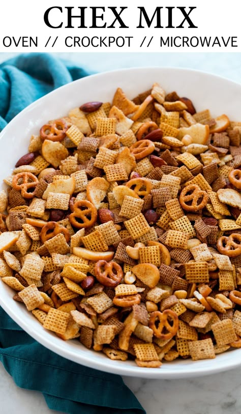 Easy classic Chex Mix - Includes options to cook in microwave, oven or slow cooker. A delicious recipe made with three types of crisp Chex cereal (wheat, rice and corn), crunchy bagel chips, salty pretzels, rich mixed nuts, and it's all coated in a well seasoned butter and Worcestershire based sauce. It's such a flavorful, nostalgic snack that's will keep you munching! #chexmix #snack #christmas Nuts N Bolts Recipe Oven Baked, Salty Chex Mix, Homemade Chex Mix Recipe, Chex Mix Original, Salty Pretzels, Chex Mix Recipes Original, Sweet Chex Mix, Snack Christmas, Sweet Chex