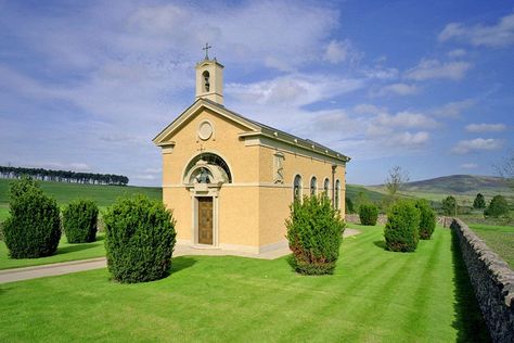 Craig Hamilton Architects Chapel, Great Britain Acclaimed classical architect Craig Hamilton created an extraordinary private Catholic chapel for a client’s estate in Great Britain. Completed in 2006 and faced with ocher-washed lime stucco, the structure—for which Hamilton’s office designed much of the furniture, lighting, and liturgical fittings—is dedicated to St. Rita of Cascia. Lourdes Grotto, Rita Of Cascia, Private Chapel, St Rita Of Cascia, Lady Hamilton, Classical Building, John Martin, Country House Design, Sacred Architecture