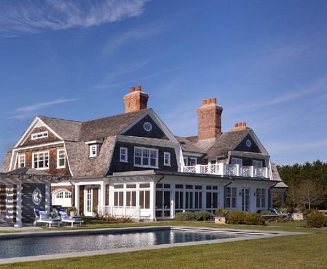 Building Our Dream Home – Inspiration – The Evans Edit    Home exterior, two story, brick and white paneling, columns, second story deck, two chimney, large rectangular outdoor pool, Ralph Lauren inspiration, the Hamptons inpiration Hamptons Houses, Preppy Pinterest, Brindleton Bay, Hamptons Homes, Victoria Hagan, Beach Mansion, Town Homes, Setting Inspiration, Hampton Style