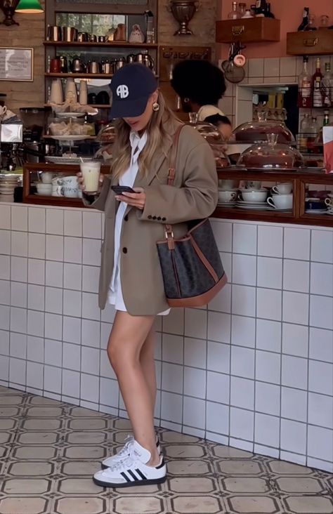 Anine Bing Hat Outfit, French Sunglasses Style, Navy Hat Outfit Baseball Caps, Daily Look Outfits Casual, Europe In November Outfits, Celine Bucket Bag Outfit, Prada Purse Outfit, Celine Outfit Style, Outfit With Samba Adidas