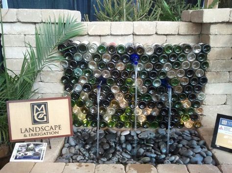 Water fountain I want to make...and I get to drink lots of wine to make it :) Wine Bottle Fountain, Wine Fountain, Bottle Fountain, Wine Bottle Trees, Koi Pond Design, Water Wall Fountain, Bottle Trees, Wine Bottle Design, Diy Fountain