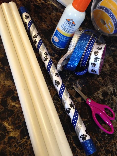 PVC Pipe turned into Spirit Sticks for each girl at the end if the season! Spirit Stick Ideas Diy How To Make, Cheerleading Spirit Stick Ideas, Cheer Spirit Sticks Ideas, Diy Cheer Spirit Stick, Cheer Competition Spirit Sticks, Cheerleader Spirit Sticks, Dance Spirit Sticks, Diy Cheer Spirit Sticks, How To Make Spirit Sticks Cheer