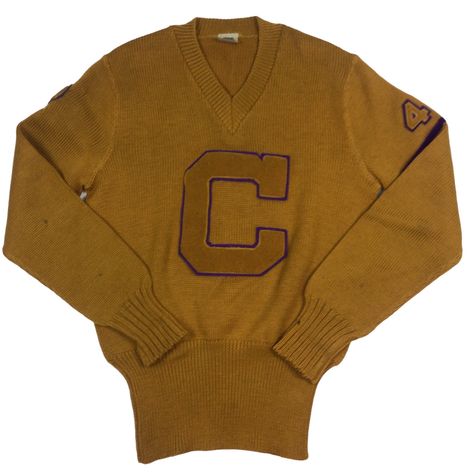 Vintage 1948 basketball varsity letterman sweater. Made in the USA. Wool. High-quality. Deep gold/mustard in color with purple trim. Patches on both sleeves. Measures as a medium. 20 inches pit to pit, 27 inches long. Overall excellent vintage condition, has a couple of light discoloration flaws on the lower sleeves as shown in last two photos. Rare vintage find. Smoke and pet free home. Vintage Varsity Sweater, Sporty Brown Sweatshirt For College, Retro Sweater For College In Fall, Vintage College Sweater For Winter, Vintage College Sweater For Fall, Vintage Sweater For College In Winter, Vintage Sweater For College In Fall, Vintage Fall Sweater For College, Vintage Winter Sweater For College