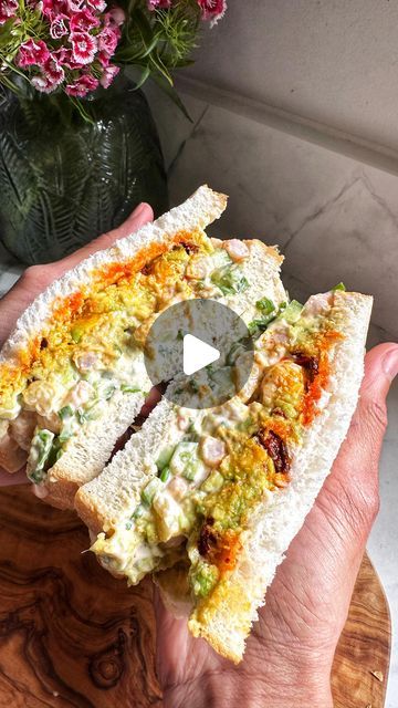 Chetna Makan on Instagram: "BETWEEN THE SLICES - Episode 26 Prawn Avocado Sandwich  1 avocado- cubed  Pinch of salt  Pinch of chilli  Pinch of black pepper  Squeeze of lemon  Handful of cooked prawns  Pinch of salt  2 tbsp mayo 1 tbsp sour cream  1 Tsp chilli ketchup  1/2 cucumber Handful of chives  Pinch of salt  Pinch of chilli powder  Squeeze of lemon  White slices of bread  Butter  Chilli oil  Enjoy x #reels #reelsinstagram #chetnamakan #recipes #sandwich #prawns #betweentheslices #lunch #fish #reelsvideo" Prawn Sandwich Recipe, Prawn Cocktail Sandwich, Prawn Toast Recipe Airfryer, Prawn Pickle, Prawn Toast Recipe, Chetna Makan, Chilli Oil, Avocado Sandwich, Bread Butter