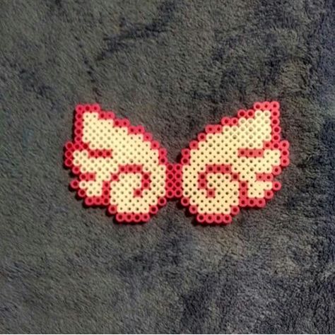 Pink angel wings Pink Angel Wings, Melt Beads, Melt Beads Patterns, Bead Keychain, Perler Ideas, Beaded Angels, Beads Patterns, Hamma Beads, Pink Angel