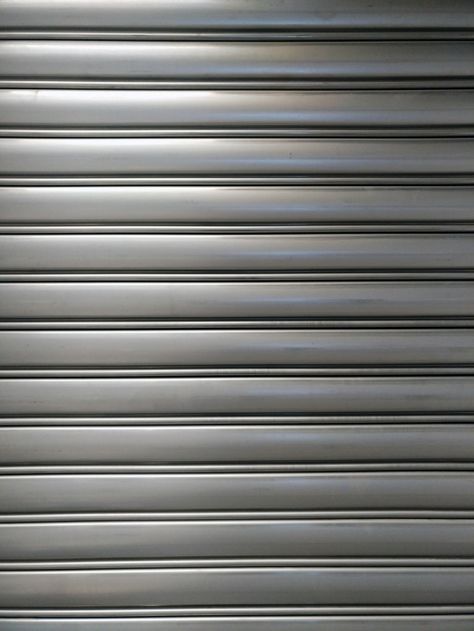 Pattern of roll-up door in horizontal li... | Premium Photo #Freepik #photo #background #pattern #abstract #texture Shutter Texture, Shop Shutter, Shutter Images, Metal Shutters, Door Texture, Rolling Shutter, Roll Up Doors, Roller Doors, Rolling Door