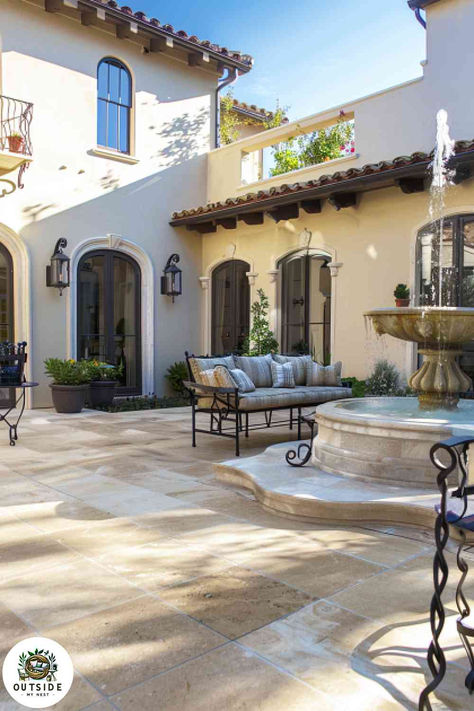 Transform your patio into an elegant retreat with travertine tiles. The fountain and wrought iron furniture add a luxurious touch. Tap to see more elegant patio tile ideas! Balcony Architecture, Spanish Interior Design, Spanish Exterior, Second Floor Balcony, Spanish Interior, Spanish Mission, Ranch Ideas, California Architecture, Mexican Hacienda