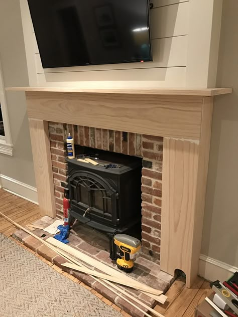 Mantel For Brick Fireplace, Diy Fireplace Surround Over Brick, Add Surround To Brick Fireplace, Easy Fireplace Mantle Diy, How To Build Fireplace Surround, Heatilator Fireplace Remodel, Making A Faux Fireplace, Corner Diy Fireplace, Build Fireplace Mantle