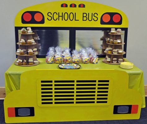 School Bus table - made from corrugate using the table top as the hood of the bus - made by my husband!!!! Coco Melon Wheels On The Bus Party, Cocomelon Bus Table, Bus Ministry Ideas, School Bus Table, Magic School Bus Party, Bus Party Theme, Bus Table, School Bus Cake, Bus Decor