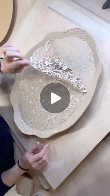 Pine Lake Pottery on Instagram: "Part 2 of the Lace Platter - this turned out great 🥳 and it’s huge! I used the 13x17 @gr.pottery.forms and a template I made in Part 1 on my cricut! 👀 A couple tips:  1. Centering a pattern under a template is tricky - I laid the lace and foam template down and then slid my template out to get it centered. 2. Leave the lace in until after you make the tray - it’ll keep the texture perfect. 3. Two foot rings to prevent sagging - a must! I might even do a third next time.  4. Weight on top during the drying process to prevent warping and don’t forget about a slow dry!  5. A thin layer of Alumina Hydrate on the kiln shelf to allow movement when it shrinks during the bisque fire.  #happypotting #handmade #laceplatter #kitchendecor #functionalpottery #cheesebo Hand Built Pottery Platters, Slab Pottery Templates, Surface Decorations, Pottery Templates, Ceramic Trays, Pottery Creations, Pottery Tray, Pottery Molds, Bisque Pottery