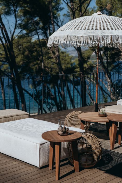 Wooden deck with lounge seats and sun umbrella, and sea views through trees. Infinity Swimming Pool, Hvar Island, Croatian Islands, Natural Heritage, Luxury Villas, Small Island, Private Villas, Furniture Outdoor, Luxury Property