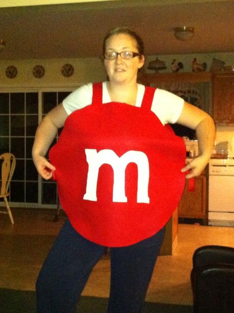 This M&M costume was very easy to make, it's sort of like an apron, strapes on the top and ties on the side, made with felt, $2.99 a yard at Joann's , you could put card on the inside to make this costume more sturdy, I had to make 8 of these for my nieces job, in all M&M colors Kids M&m Costume, Diy M&m Costume For Kids, M Ms Costume, Green M&m Costume, M&m Costume Diy, M M Halloween Costume, M&m Halloween Costume, M&m Costume, Halloween Food Crafts