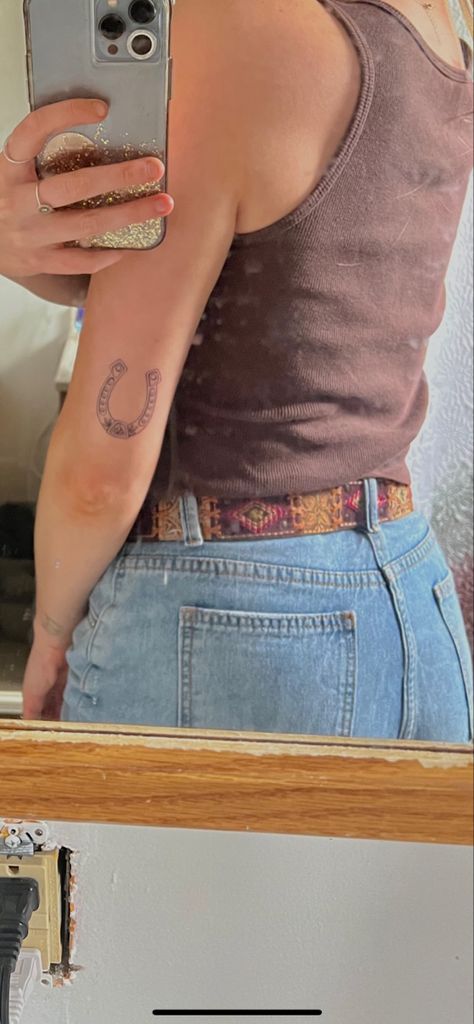 Red In Tattoos, Punchy Western Tattoos Simple, Fineline Cowgirl Tattoo, Minimal Country Tattoo, Western Tattoos Forearm, Horse Saddle Tattoo, Texas Related Tattoos, Murphy’s Law Tattoo, Fineline Horseshoe Tattoo